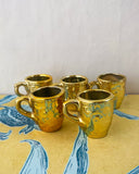 Små guldiga koppar DessinDesign