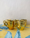 Små guldiga koppar DessinDesign