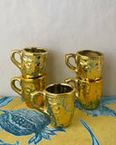 Små guldiga koppar DessinDesign